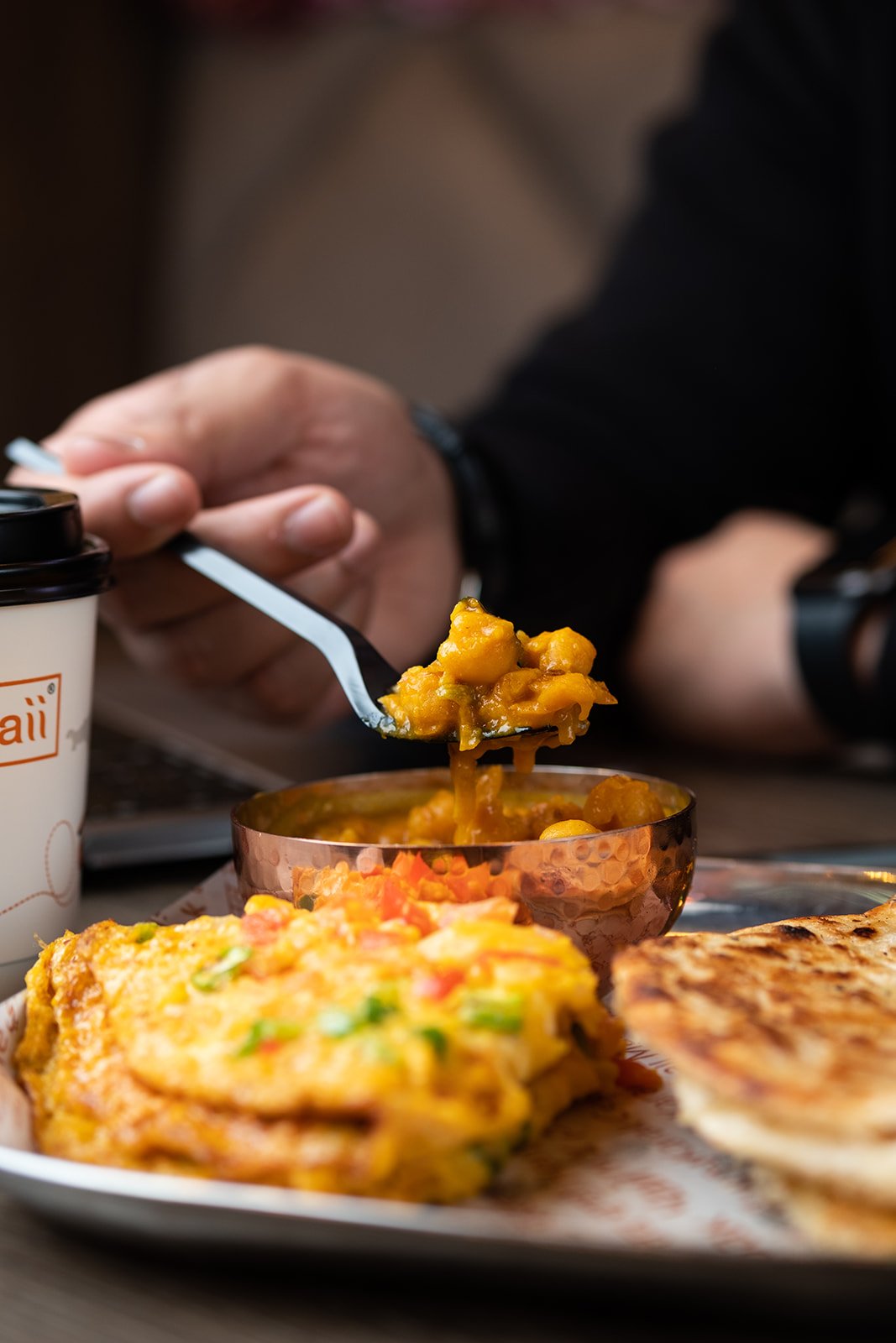 Eating Masala Omelette